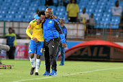 Sundowns' Percy Tau  and coach Pitso Mosimane celebrate one of the  team's  best moments this year.  /  Lefty Shivambu / Gallo Images