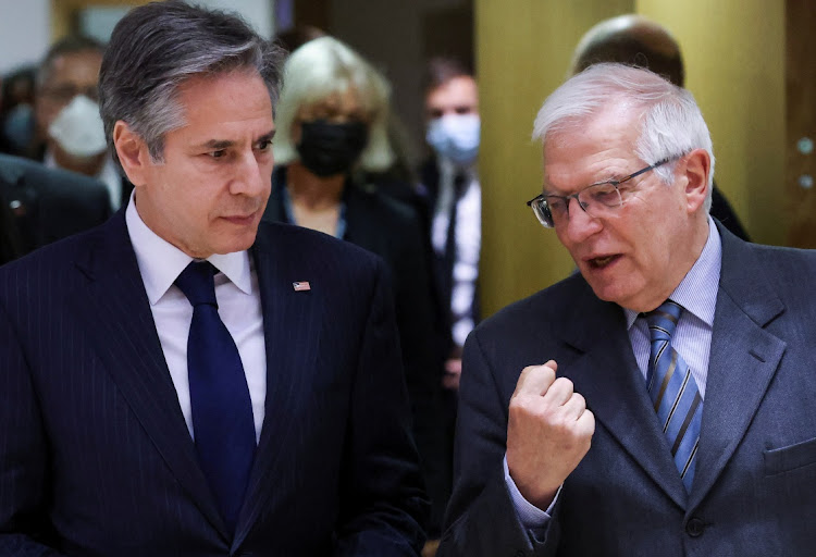 High representative of the European Union for foreign affairs and security policy Josep Borrell speaks to US secretary of state Antony Blinken at the start of the EU foreign ministers meeting, amid Russia's invasion of Ukraine, in Brussels, Belgium March 4, 2022. REUTERS/Yves Herman