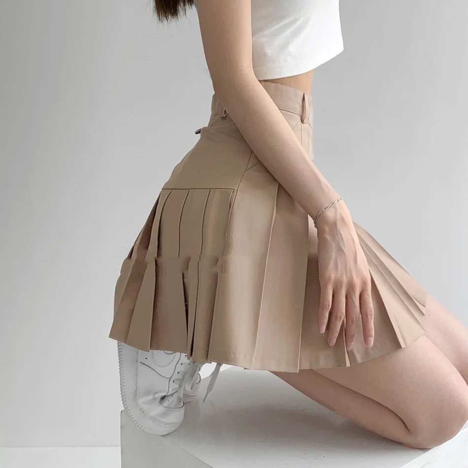Jupe plissée taille haute longue pour femme, style universitaire. Élégante et confortable, idéale pour un look décontracté ou plus habillé, parfaite au quotidien.