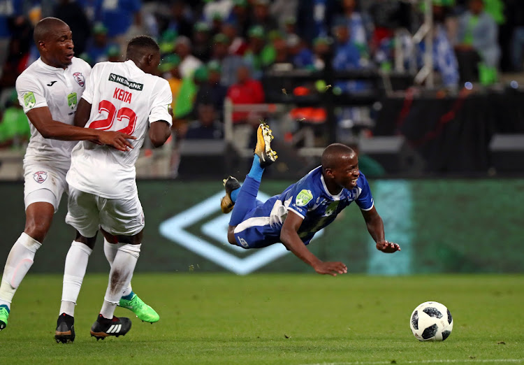 Maritzburg United and Bafana Bafana attacking midfielder Siphesihle Ndlovu goes down under a challenge during the Nedbank Cup final against Free State Stars on May 19 2018. Ndlovu was nominated in four categories for the Premier Soccer League end-of-season awards ceremony.