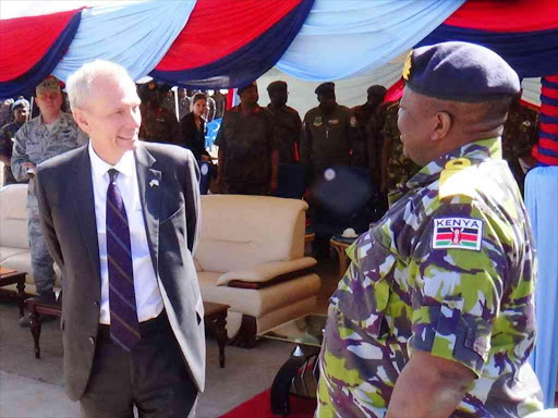 US Ambassador to Kenya Robert Godec with Chief of Defense Forces Samson Mwathethe at Laikipia Air Base yesterday. The Ambassador had gone to unveil Six of the Eight Bell Huey 11 helicopters given to Kenya by the American government.