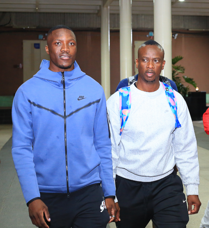 Botswana's Letsile Tebogo and his coach Kebonyemodisa Dose Mosimanyane arrive at JKIA on Wednesday night