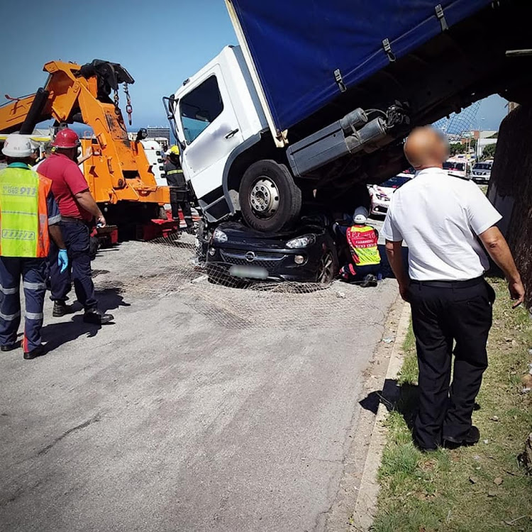 The truck reportedly rolled after being parked.