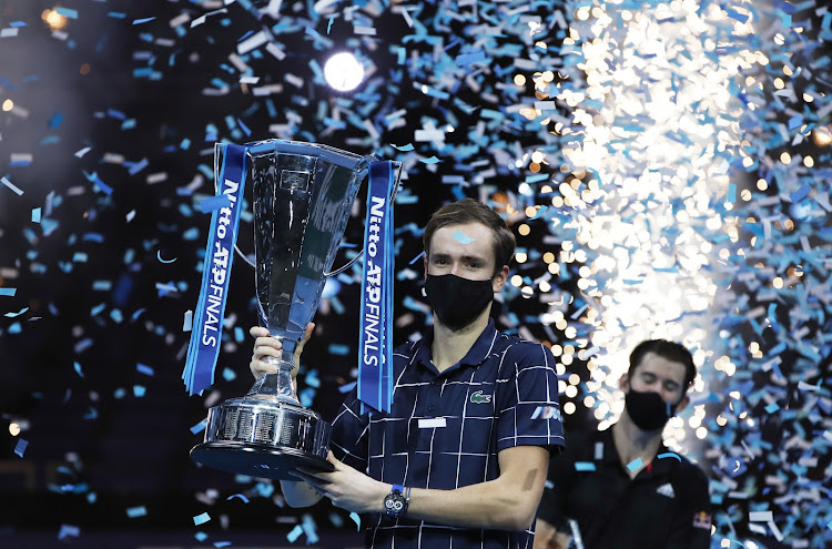 Russia's Daniil Medvedev lifts the trophy as he celebrates winning the final match against Austria's Dominic Thiem.