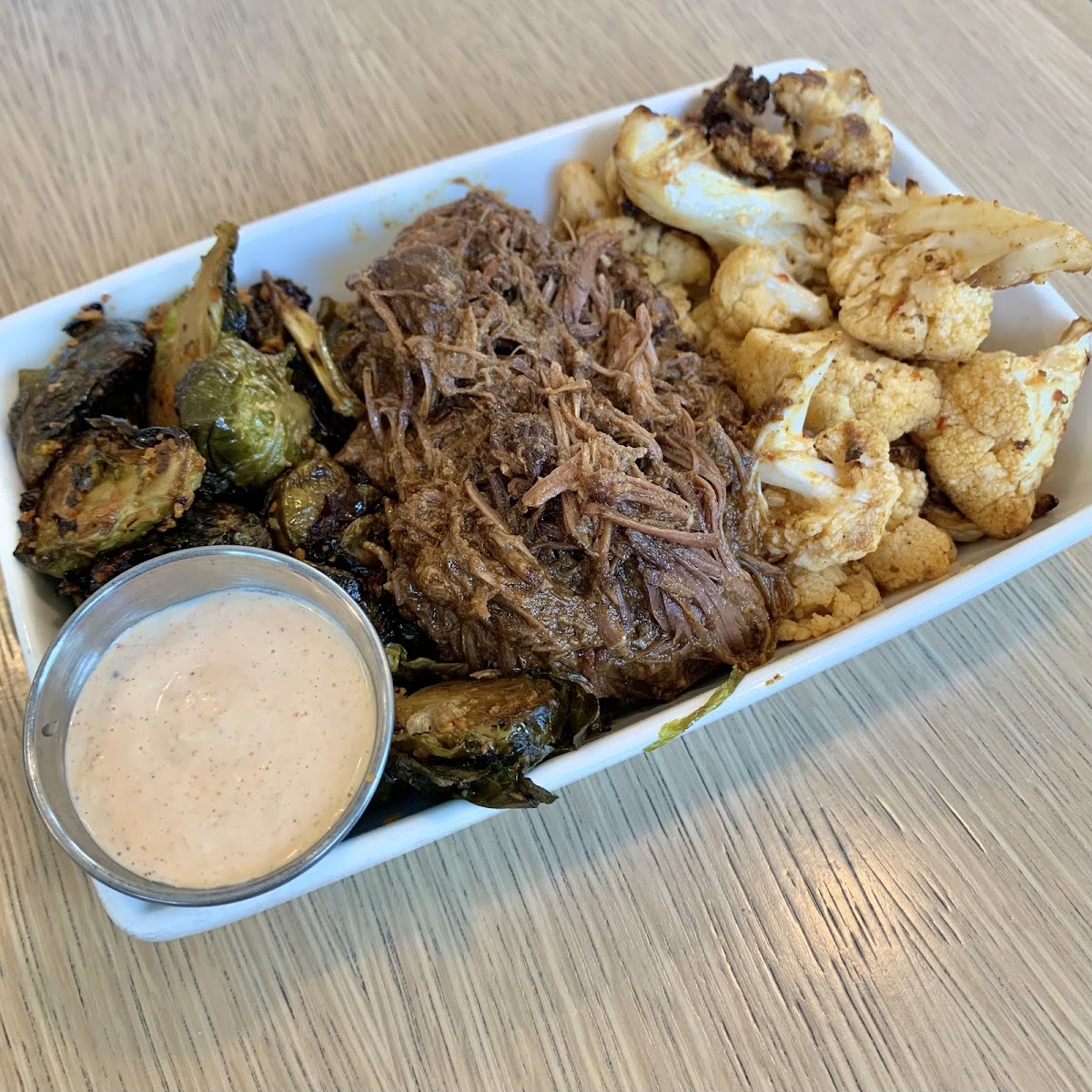 Braised beef with brussel sprouts and cauliflower