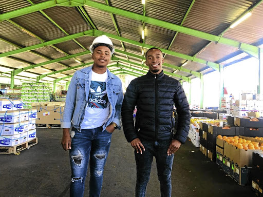 Informal traders Bonga Mbucane and Kgosi Mashigo at the People's Market in City Deep.