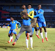 Abubeker Nasir of Mamelodi Sundowns celebrates his goal with teammates in the Caf Champions League Group B match against Coton Sport at Loftus Versfeld in Pretoria on April 1 2023.