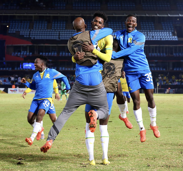 Abubeker Nasir of Mamelodi Sundowns celebrates his goal with teammates in the Caf Champions League Group B match against Coton Sport at Loftus Versfeld in Pretoria on April 1 2023.