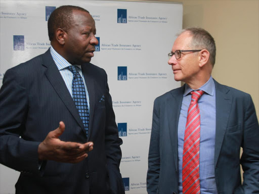 Africa Trade Insurance Agency CEO George Otieno with chief underwriting officer Jeff Vincent at a press briefing in Nairobi on June 2 /ENOS TECHE