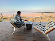 The writer at Zulu Rock Lodge, which overlooks kilometres of pristine bush.