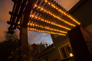 light fixtures on pergola outdoor living space in Michigan in the fall