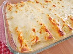 Creamy Chicken Enchiladas with white sauce was pinched from <a href="https://www.thecountrycook.net/creamy-chicken-enchiladas/" target="_blank">www.thecountrycook.net.</a>