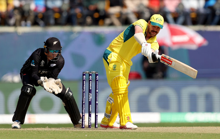 Travis Head of Australia bats during the ICC Men's Cricket World Cup India 2023 Group Stage Match against New Zealand at HPCA Stadium on October 28, 2023 in Dharamsala, India.