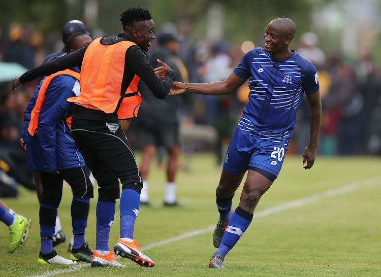 Judas Moseamedi of Maritzburg United celebrates goal with teammates.