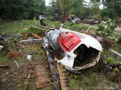 A broken jet ski is seen among debris after a tsunami hit Tanjung Lesung beach in Banten, Indonesia, December 23, 2018. /REUTERS