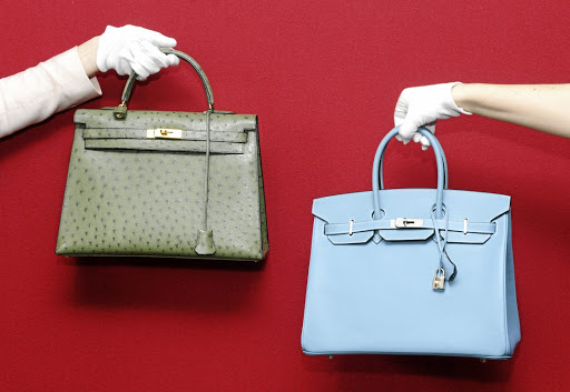 An Hermes Birkin and an Hermes Kelly bag at a pre-auction photo call for Hermes handbags at Bonhams, Knightsbridge, London.