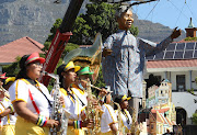 The Madiba puppet entertaining the crowd  during the  Cape Town Carnival.