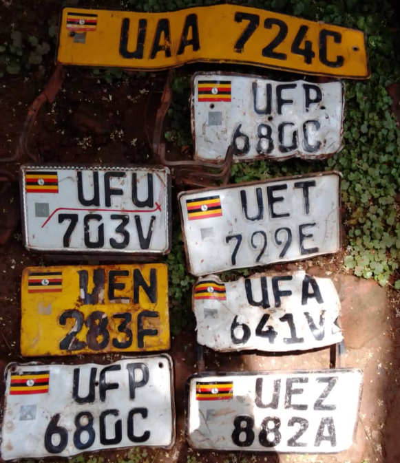 The eight motorcycle number plates found at Muganda Ali Garage in Natete Rubaga division.