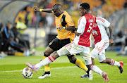 NO WAY THROUGH: Mosa Lebusa of Ajax Cape Town tries to dispossess George Maluleka of Kaizer Chiefs during the Absa Premiership match between Amakhosi and the Urban Warriors at FNB Stadium, outside Soweto, last night