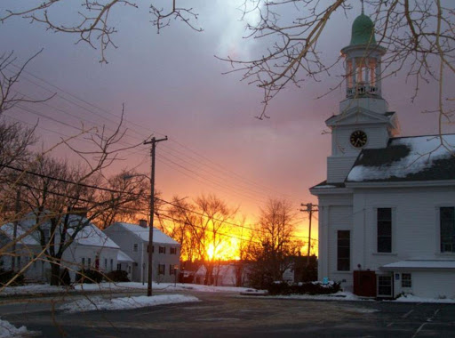 This picture was taken in Wellfleet Mass. at sunset. This is a Methodist church and the only church that still rings the ships time.