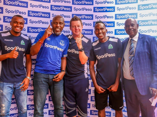 From L to R: Gor Mahia FC and Rwanda international striker, Jacques Tuyisenge, SportPesa’s Chief Marketing Officer, Kelvin Twissa,Gor Mahia FC head coach, Dylan Kerr, Burundian international and Gor Mahia defender, Karim Nizigiyimana and Gor Mahia Vice Chairman, John Pesa after a press conference in Nairobi on September 12, 2018.PHOTO/SPN