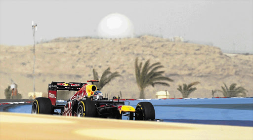 Red Bull Formula 1 driver Sebastian Vettel of Germany won the Bahrain F1 Grand Prix at the Sakhir circuit in Manama yesterday to edge challenger Lewis Hamilton off the top of the drivers' standings by four points Picture: STEVE CRISP/GALLO IMAGES