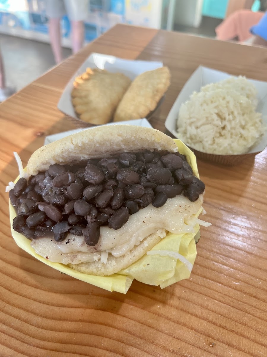 Plant based Domino arepa, mushroom empanadas, and a side of rice