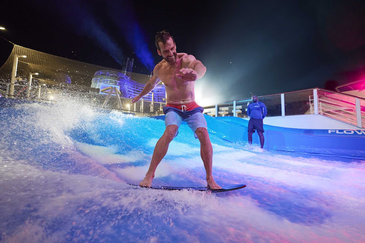 Try your surfing skills on FlowRider on Spectrum of the Seas. 