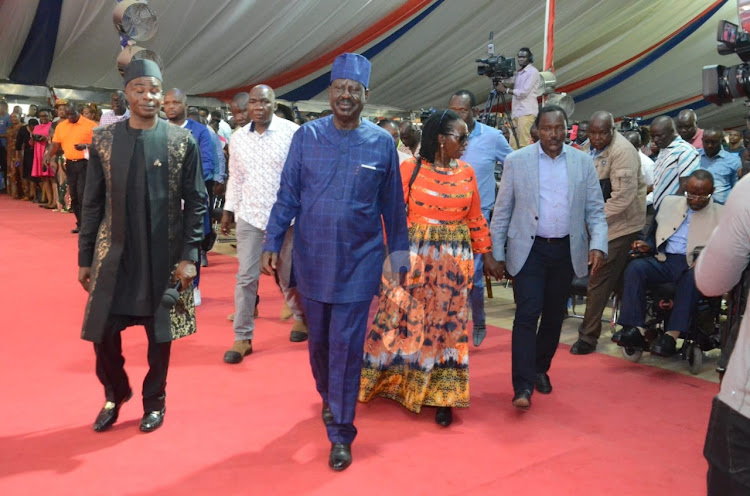 Azimio presidential candidate Raila Odinga, running mate Martha Karua, Wiper party leader Kalonzo Musyoka and other leaders during a church service at JTM Donholm on August 21, 2022.