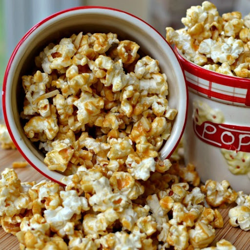 This easy Caramel Popcorn combines freshly microwaved popcorn with homemade caramel and almond slivers.  Perfect for movie night or game night.