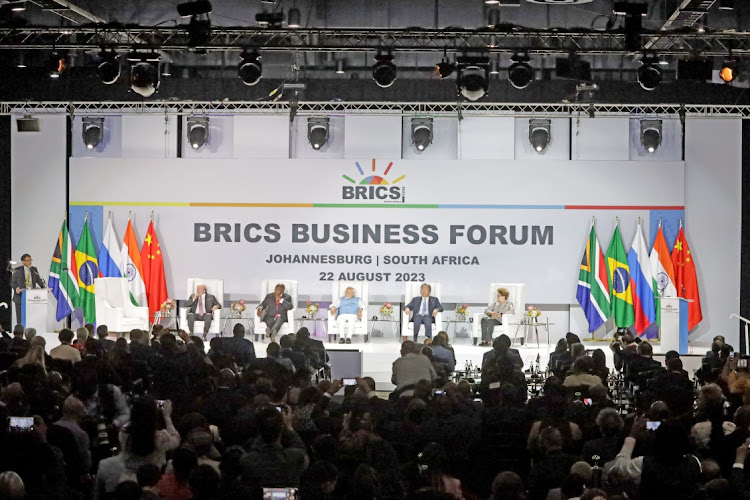 Trade and industry minister Ebrahim Patel, Brazilian President Luiz Inácio Lula da Silva, President Cyril Ramaphosa, Prime Minister of India Narendra Modi, China's minister of commerce Wang Wentao and former president of Brazil Dilma Rousseff at the Brics Business Forum in Sandton.