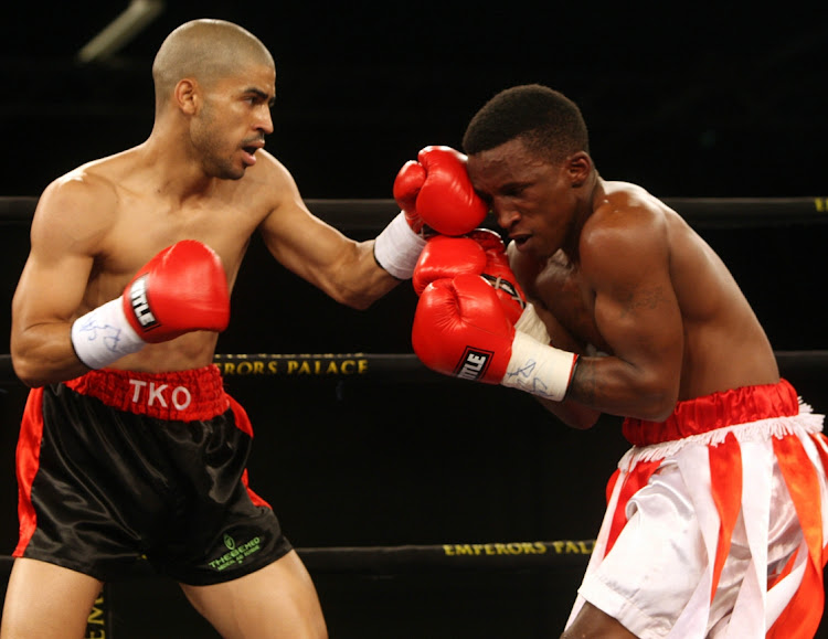 Joshua Studdard,L, with Morapedi Khotle during their Junior Bantam at Emperors Palace in Ekurhuleni. Studdard takes on Akani Sambu for the vacant Inter-Continental bantamweight title in Pretoria on October 1.