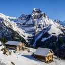 Wooden house in the snowy mountains