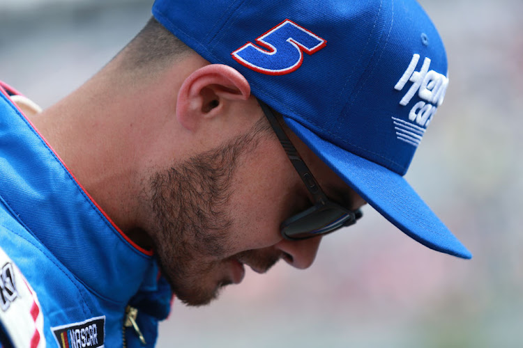 Kyle Larson waits on the grid prior to the NASCAR Cup Series Pocono Organics CBD 325 at Pocono Raceway on June 26, 2021 in Long Pond, Pennsylvania.