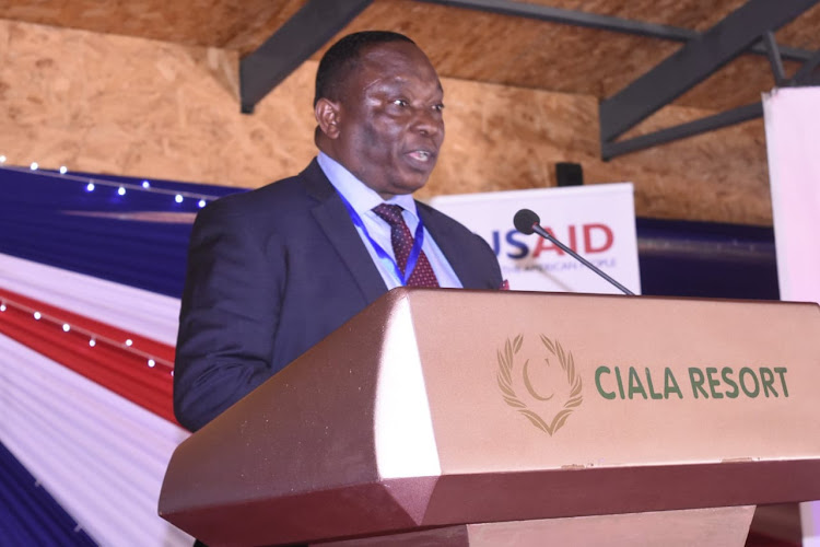 Kenya National Chamber of Commerce and Industry President Richard Ngatia speaks during the launch of a workshop on Water, Sanitation and Menstrual Hygiene (WASH) in Kisumu.