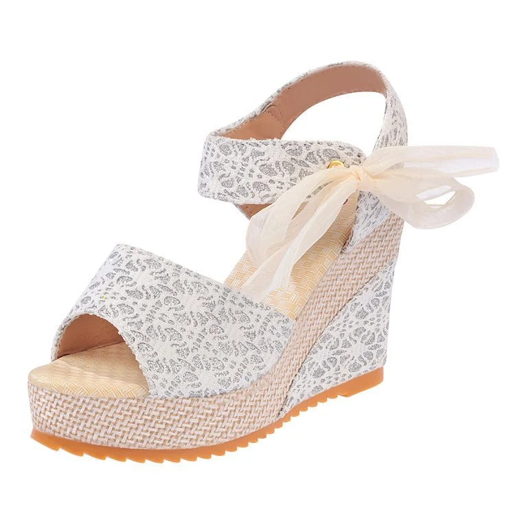 Sandales compensées tendance à talon super haut et ruban pour femmes. Parfaites pour toutes les occasions, confortables et stylées.