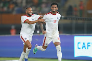 Cape Verde goal poacher Ryan Mendes celebrates scoring with teammates during the 2023 Africa Cup of Nations last 16 match against Mauritania at the Felix Houphouet Boigny Stadium in Abidjan, Ivory Coast on January 29 2024.