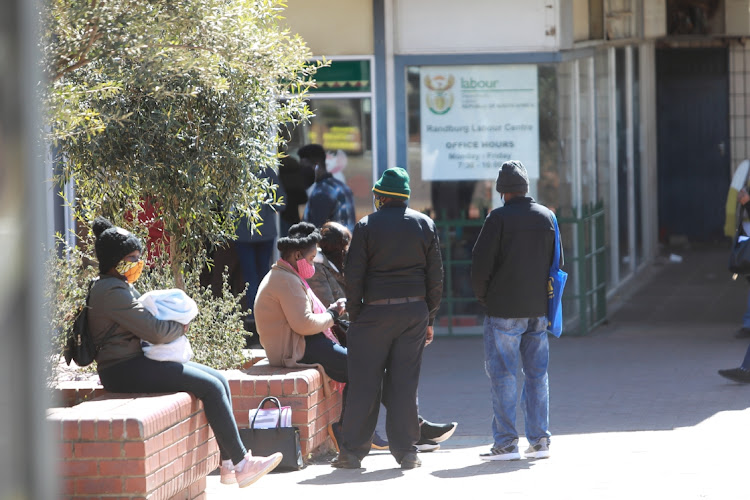 People queue for Covid-19 Ters benefits at the Unemployment Insurance Fund offices in Johannesburg. File photo.