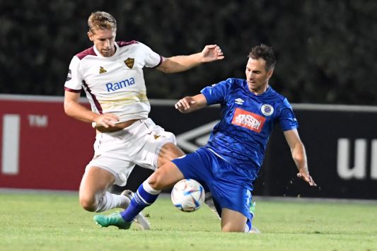 SuperSport United striker Bradley Grobler and Julian-Lasse Sobiech of Stellenbosch FC during the DStv Premiership match at TUT Stadium on Tuesday.