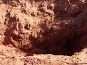 The body of a missing Northern Cape woman was found buried in a shallow grave on Thursday.