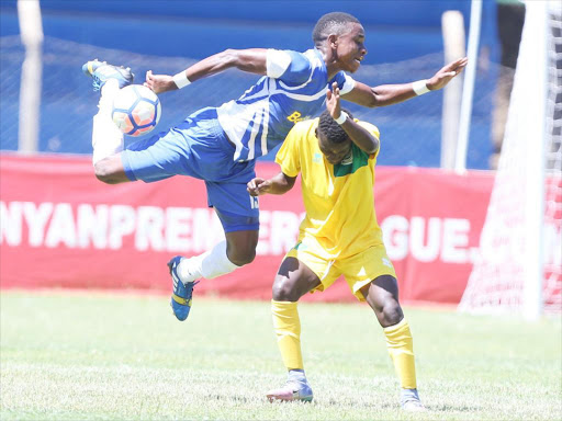 Omar Moussa of Sofapaka tackles David Owino of Mathare United in yesterday’s action. /OLIVER MORGAN