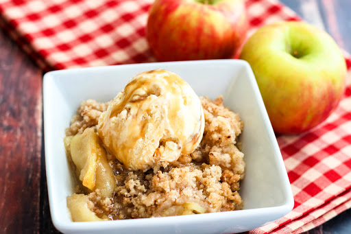 Nana's Apple Crisp with a scoop of vanilla ice cream.