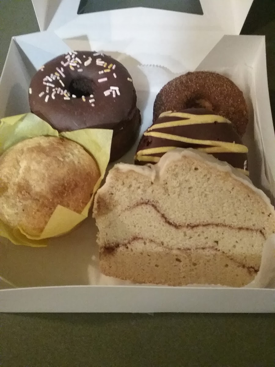 Donuts: pumpkin, chocolate orange, double chocolate,  citrus muffin and cinnamon roll