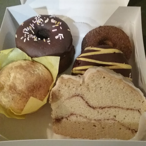 Donuts: pumpkin, chocolate orange, double chocolate,  citrus muffin and cinnamon roll