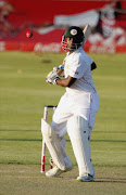 Tinotenda Mawoyo bats during the opening day of the test match between Zimbabwe and Pakistan at Queens Sports Club in Bulawayo on September 1, 2011