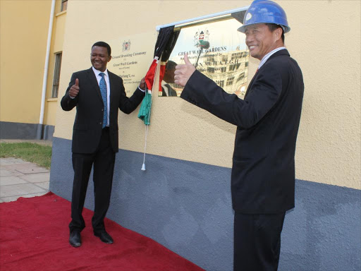 Machakos Governor Alfred Mutua and Eldemann Properties MD Zeyun Yang during the commissioning of the Great Wall Gardens 1 and groundbreaking of Great Wall 2 in Athi River on Tuesday /GEORGE OWITI