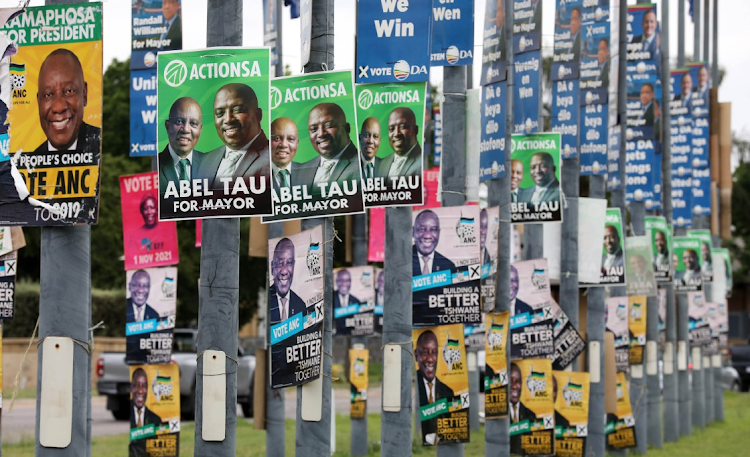 Political parties' election posters jostle for visibility on the streetlights post national and provincial elections on May 29.