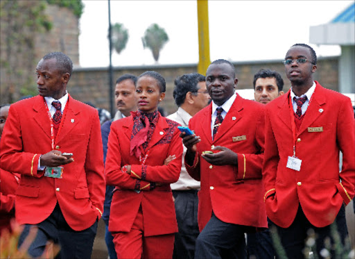 EXPERIENCED: Kenya Airways staff outside Jomo Kenyatta International Airport in Nairobi. AFP PHOTO /Stringer