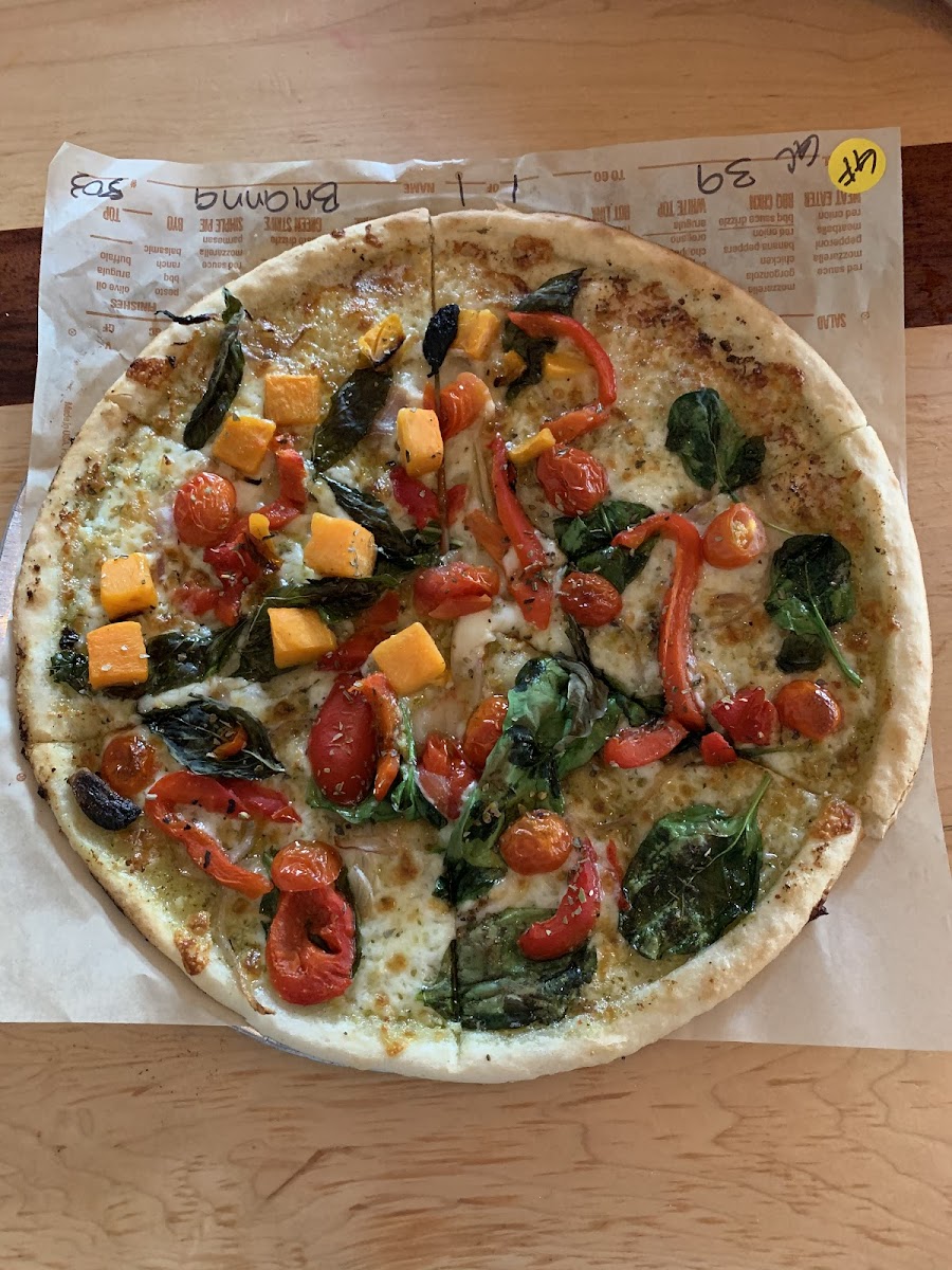 GF veggie pizza with pesto, vegan cheese and squash