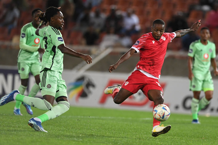 Vusimuzi Mncube of Sekhukhune United and Olisa Ndah of Orlando Pirates during the DStv Premiership match between Sekhukhune United and Orlando Pirates at Peter Mokaba Stadium.